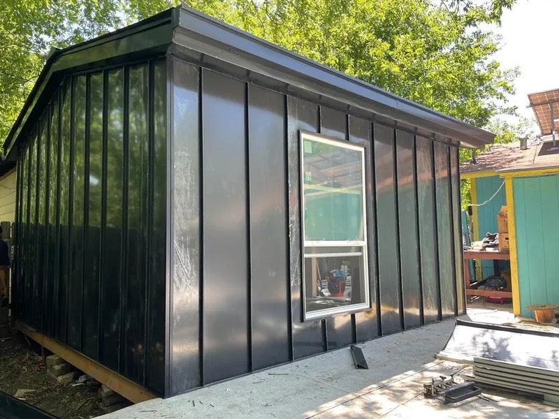 Black standing seam metal wall panels for Roof Inspection in Carlsbad